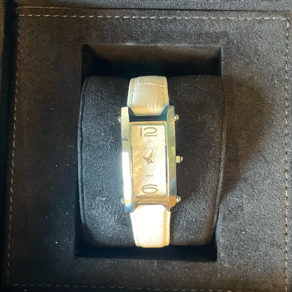 NIB Women’s Polanti Tulip watch. White leather band, pearl face.